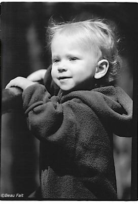 Nyrie Standing on a Railing